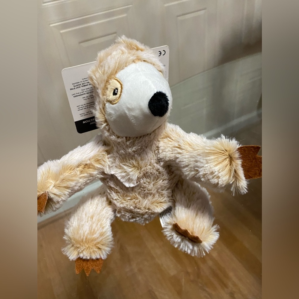 - Brand New Giftable 8” Dog Toy With Squeaker.